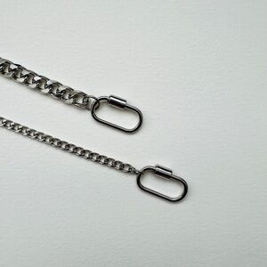 Men's chunky silver tone carabiner necklace on cuban chain of choice